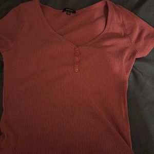 This is a hot pink women’s top perfect for any occasion